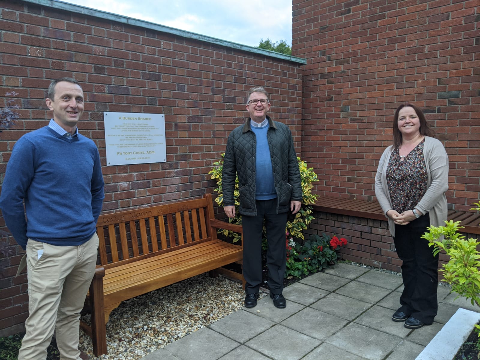 Father Joe, Aideen and Father Tony's brother at the blessing of the memorial